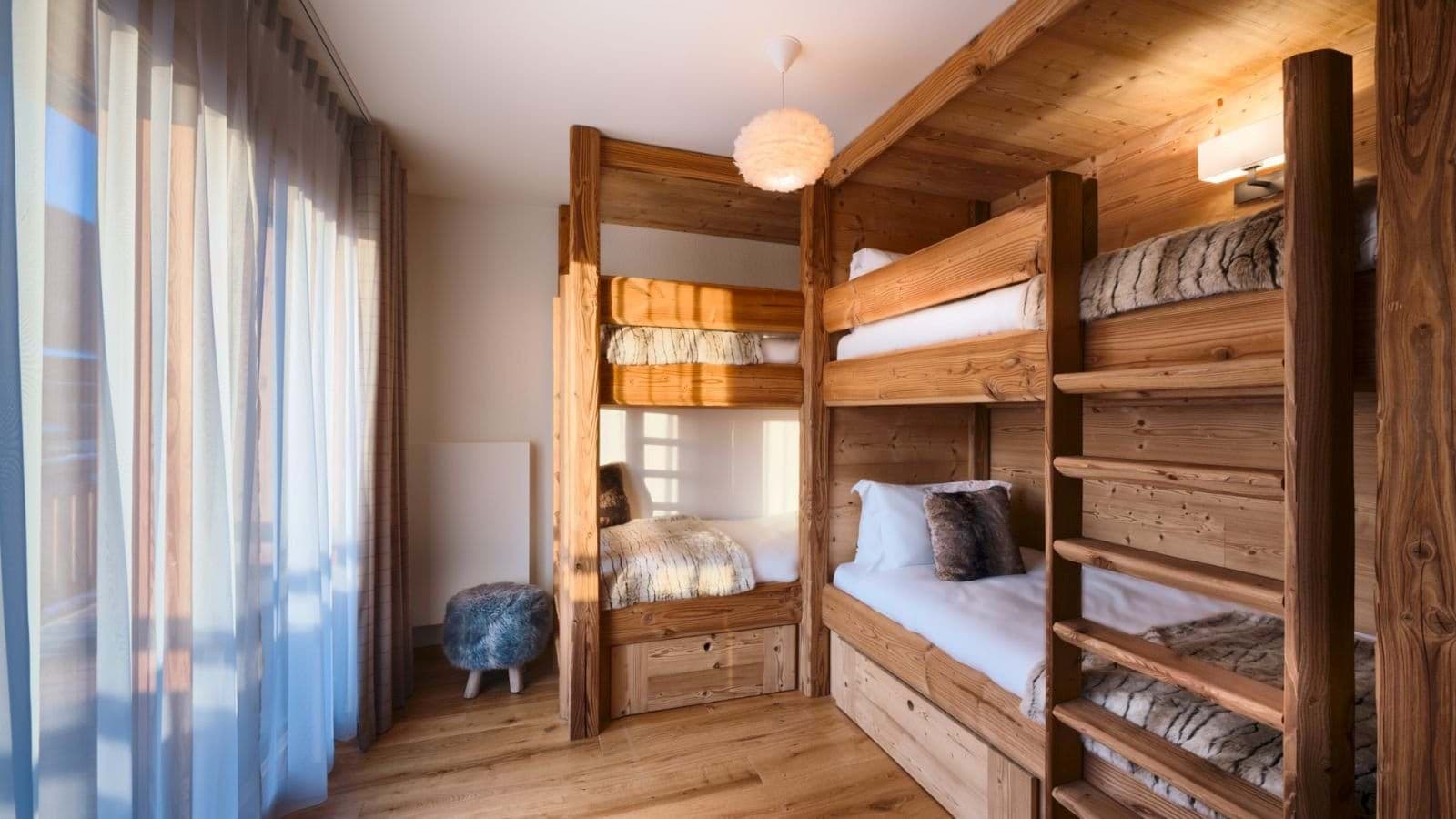 Bunk room sleeps 4; built-in timber frames with under-bed storage drawers