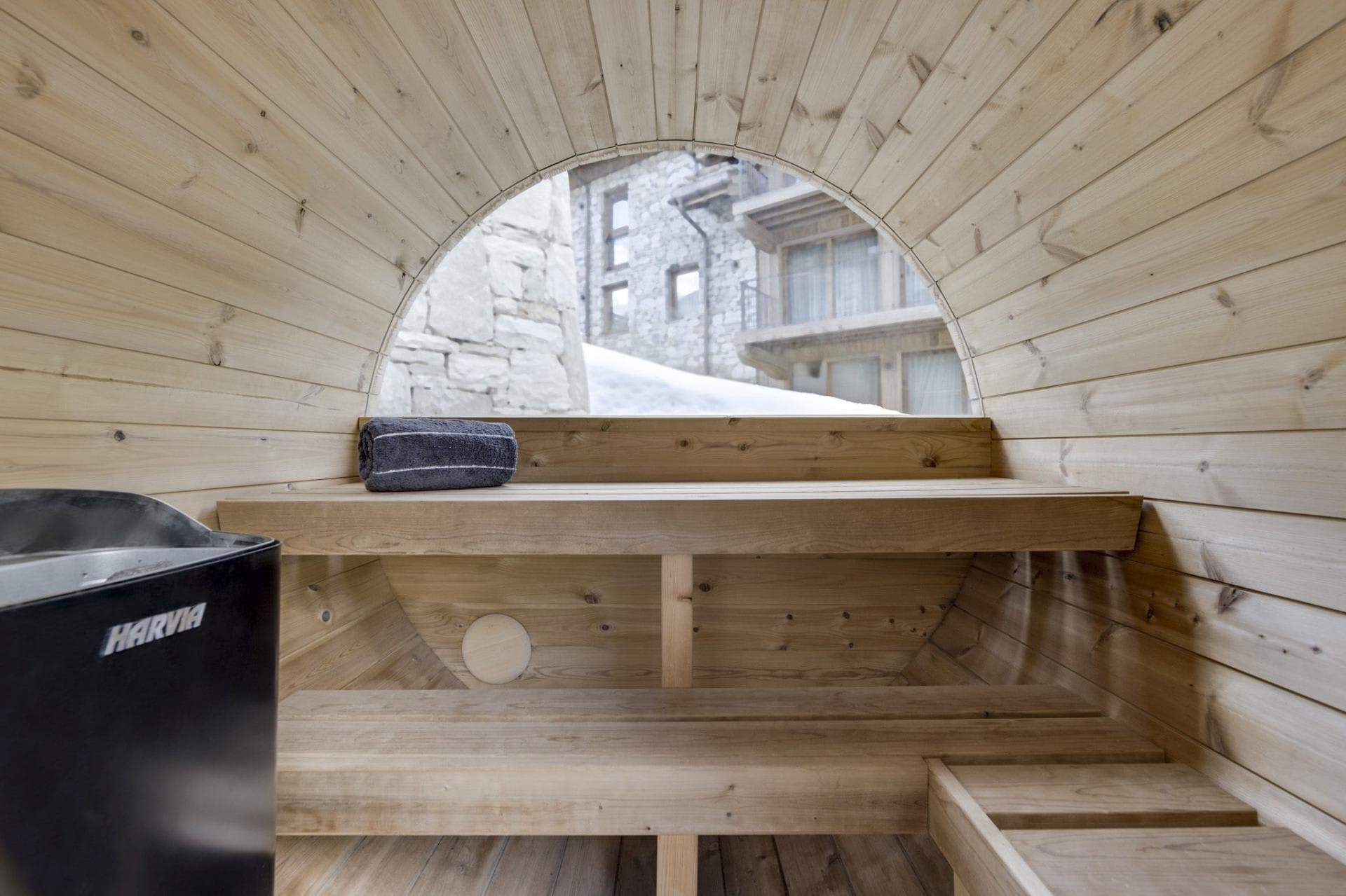 Barrel sauna with Harvia electric heater and panoramic window
