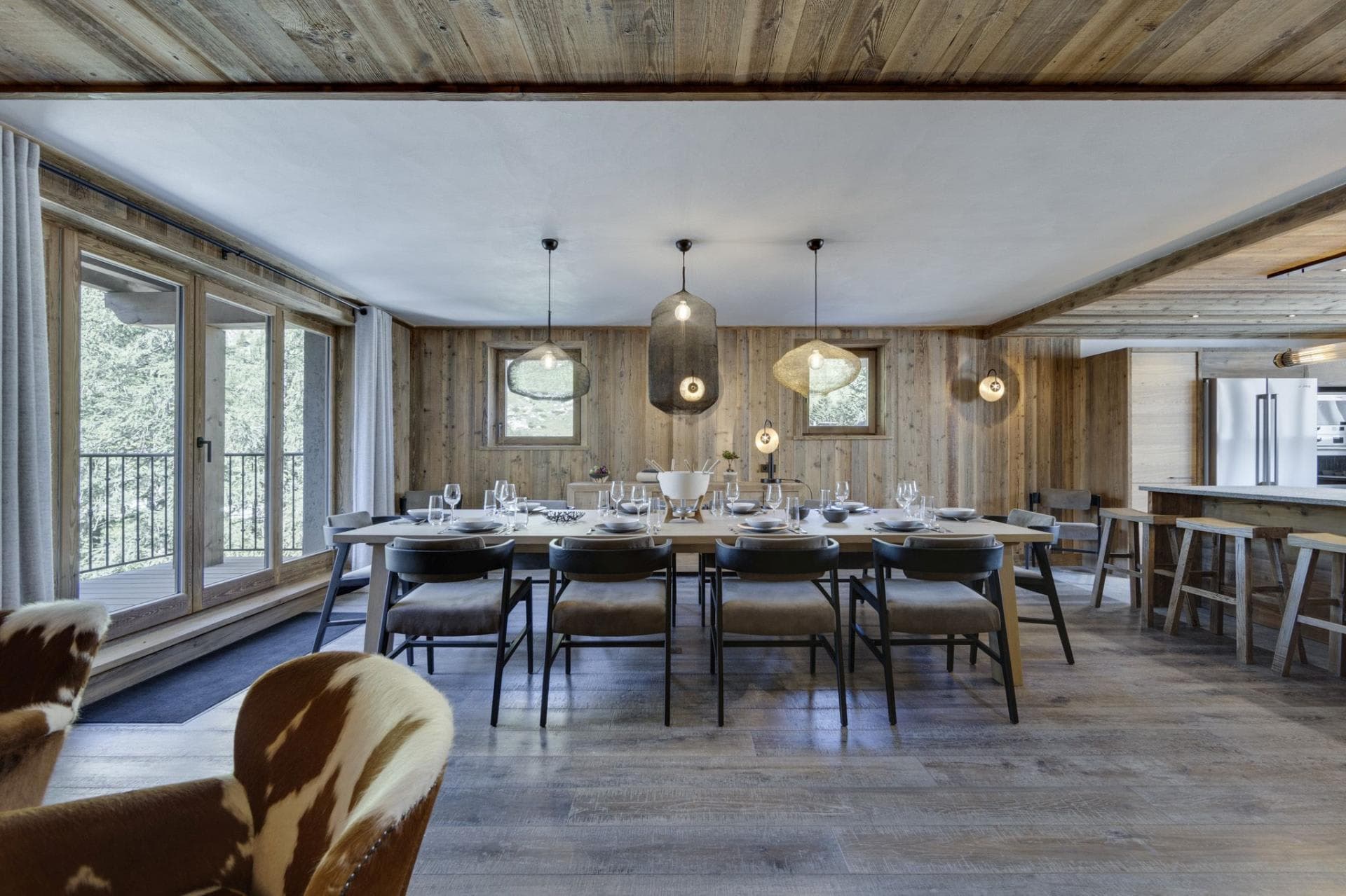 Dining table with seating for 10; adjacent to terrace and kitchen