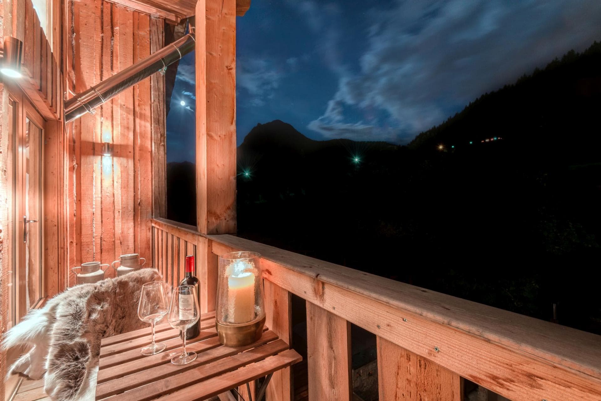 Private balcony with mountain views and folding bistro table