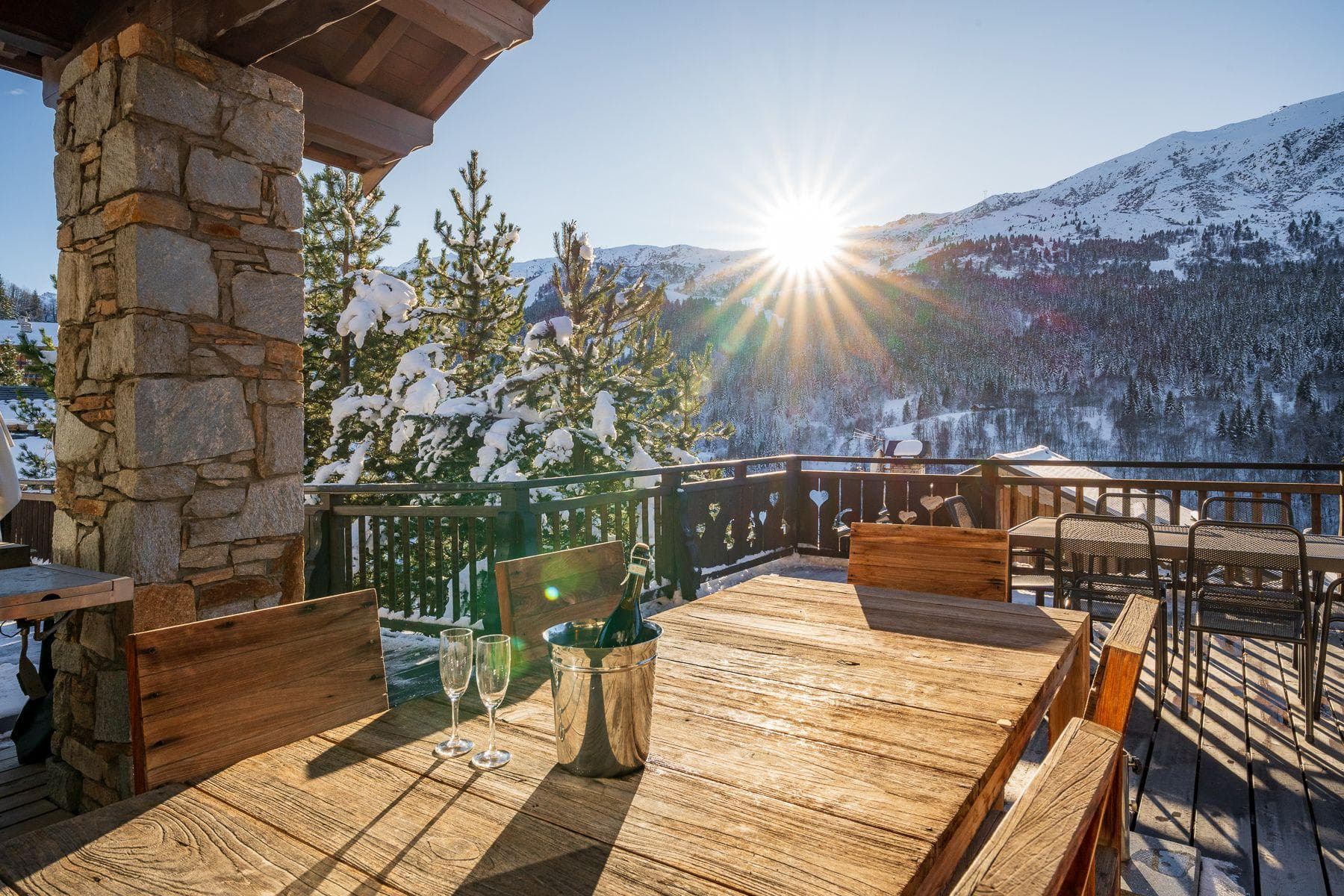 Private terrace with dining for 8 and mountain sunset views