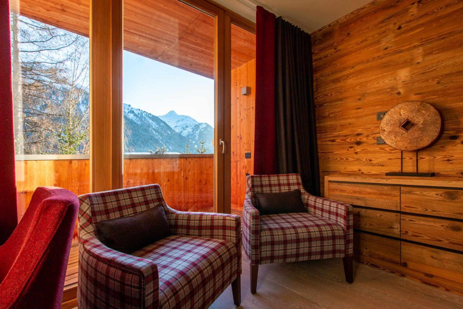 Seating area with mountain views and direct balcony access