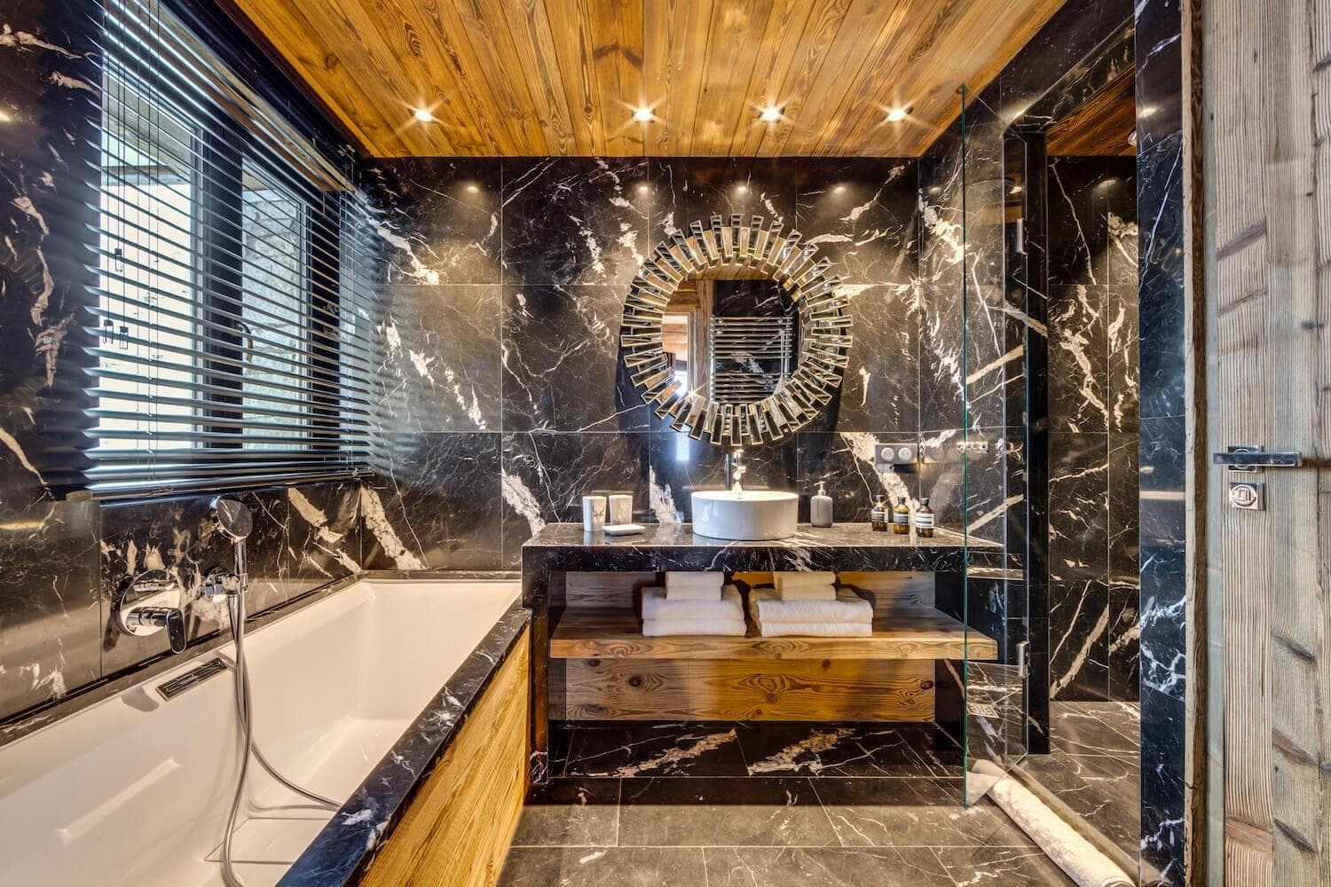 Bathroom with deep soaking tub and glass walk-in shower