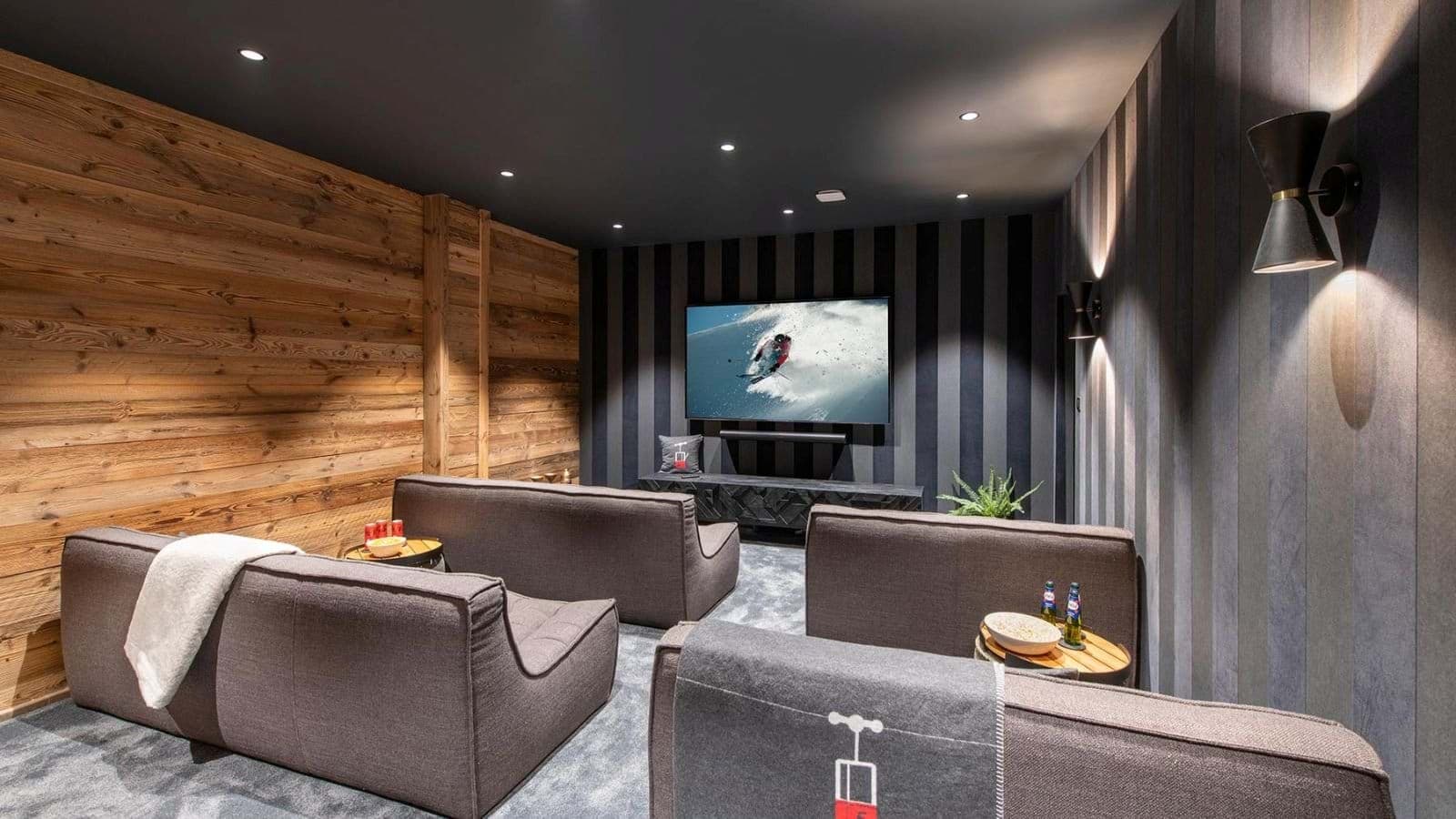 Media room with tiered lounge seating and Sonos soundbar