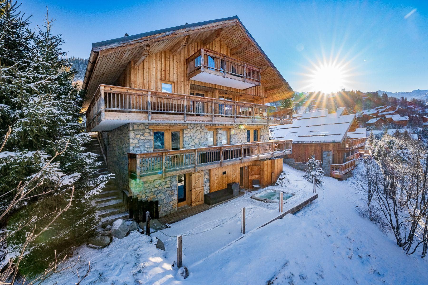 Ski-in chalet with wrap-around balconies and ground-floor hot tub