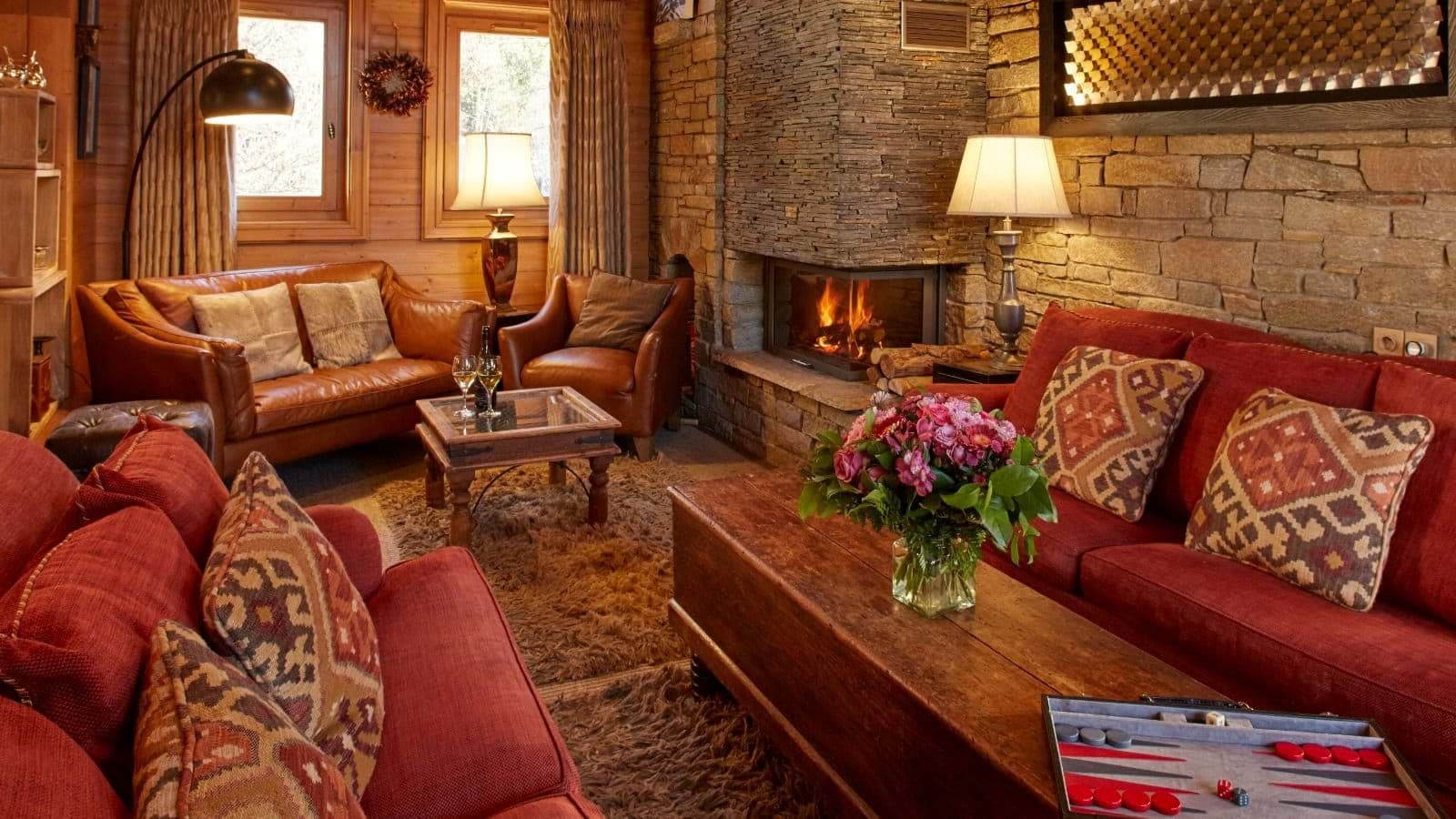 Living room with wood-burning stone fireplace and seating for 7